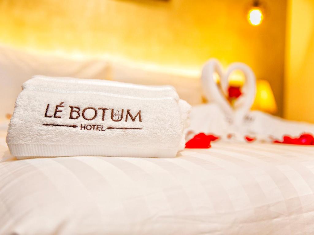 Le Botum Hotelにあるベッド