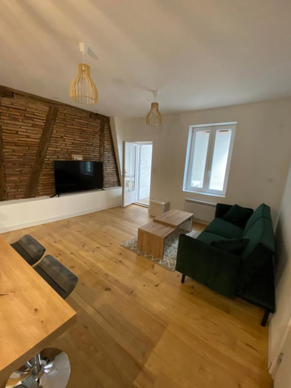 Χώρος καθιστικού στο Logement tout équipé