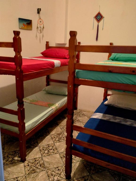 Postel nebo postele na pokoji v ubytování Jurema Hostel