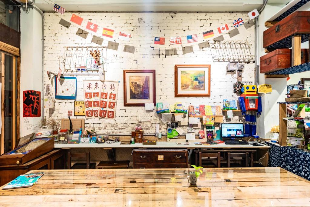 Kuchyň nebo kuchyňský kout v ubytování Fuqi Hostel - Yuanqi