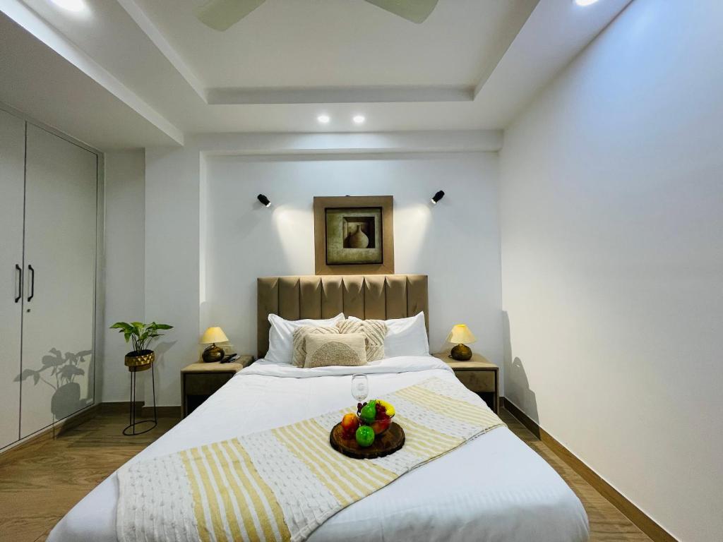 Postel nebo postele na pokoji v ubytování Bedchambers Serviced Apartments, Ardee City