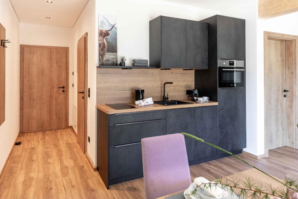 Кухня или мини-кухня в Feiserhof Navis - Appartements
