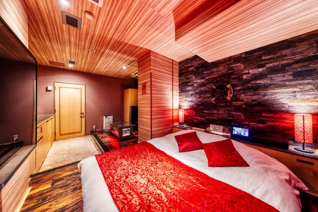 Postel nebo postele na pokoji v ubytování Hotel Atlantis Machida -Adult Only