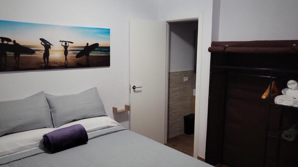 Postel nebo postele na pokoji v ubytování Captain Morgan House