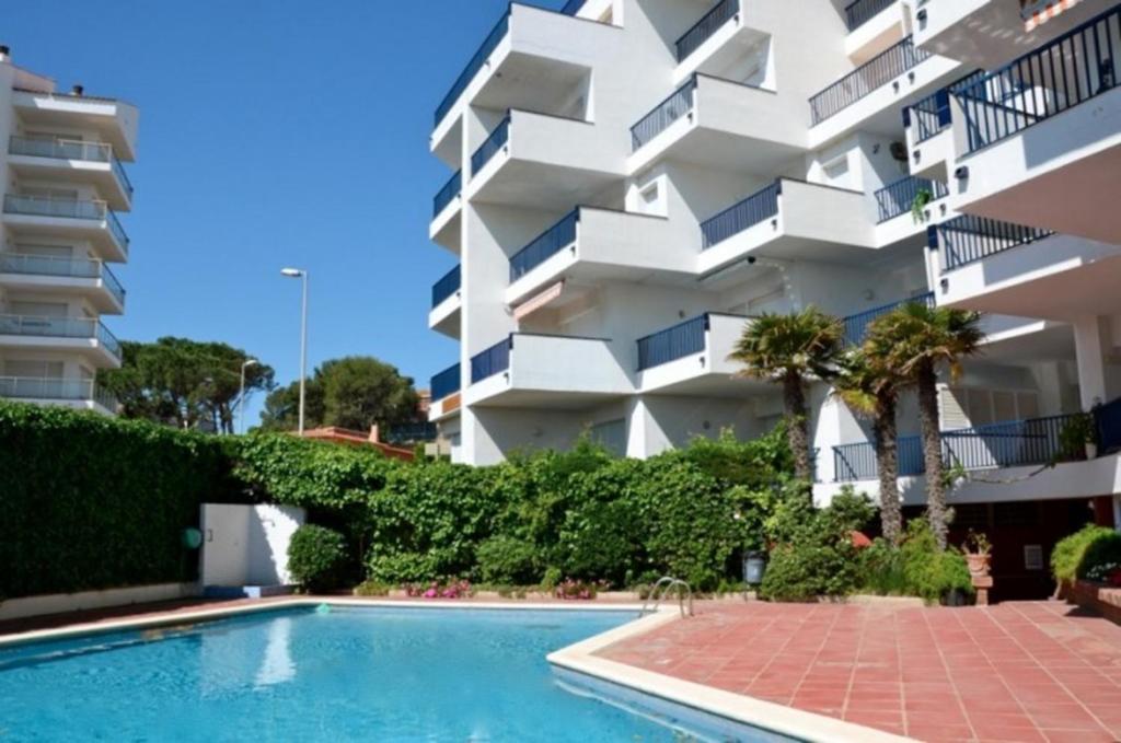 Bazén v ubytovaní Passeig Del Mar - apartamentos primera linea alebo v jeho blízkosti