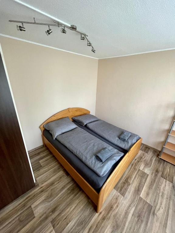 Postel nebo postele na pokoji v ubytování Apartmán VS Františkovy Lázně