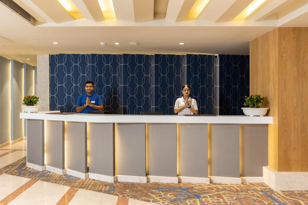Členové personálu v ubytování Citadel Sarovar Portico Bengaluru