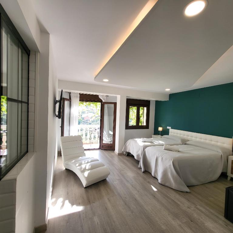 Posteľ alebo postele v izbe v ubytovaní Hostal El Cerro - Only Adults