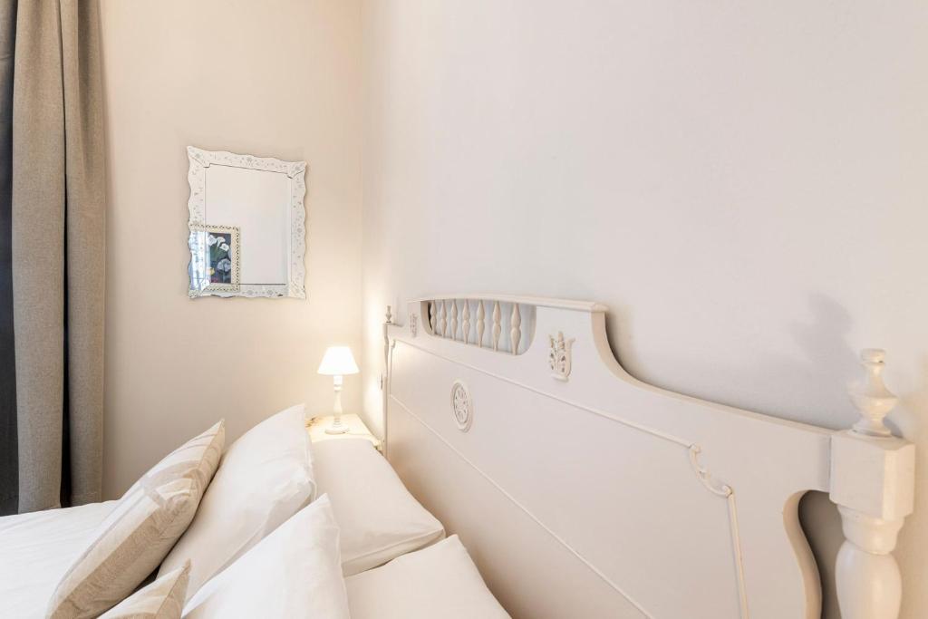 Postel nebo postele na pokoji v ubytování B&B De I Bravi