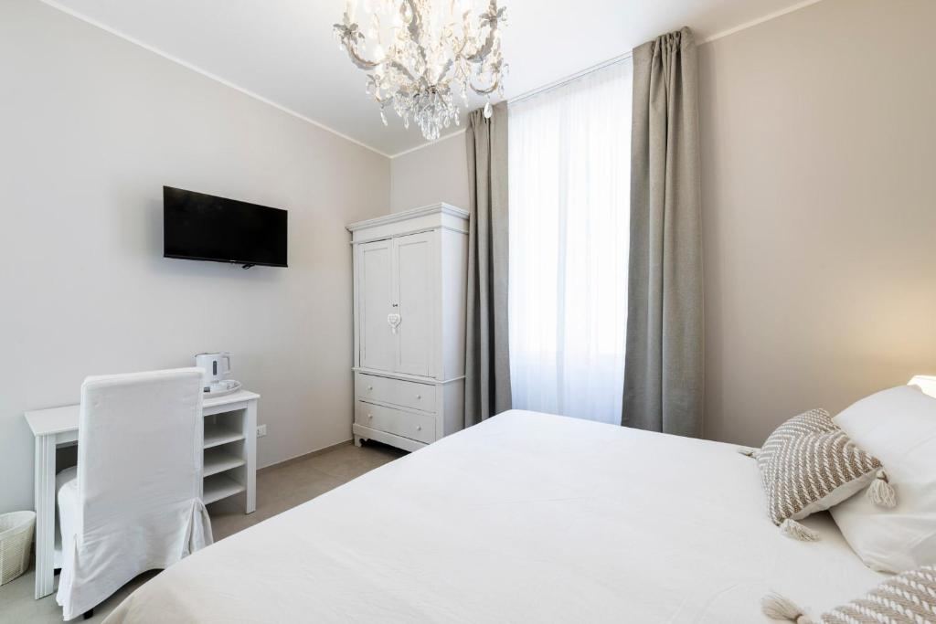 Postel nebo postele na pokoji v ubytování B&B De I Bravi