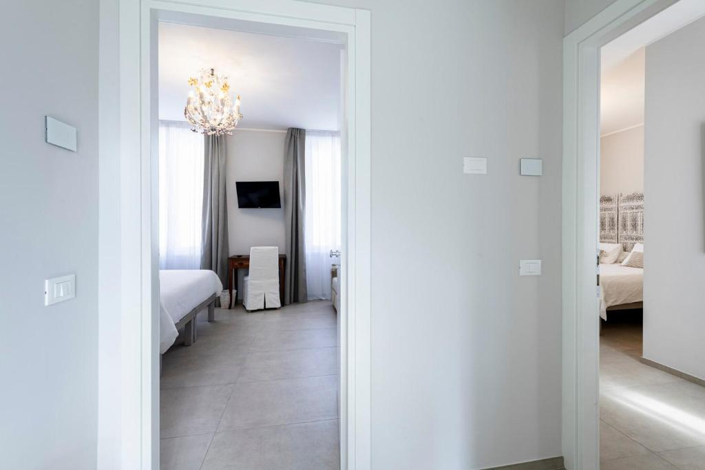 Postel nebo postele na pokoji v ubytování B&B De I Bravi