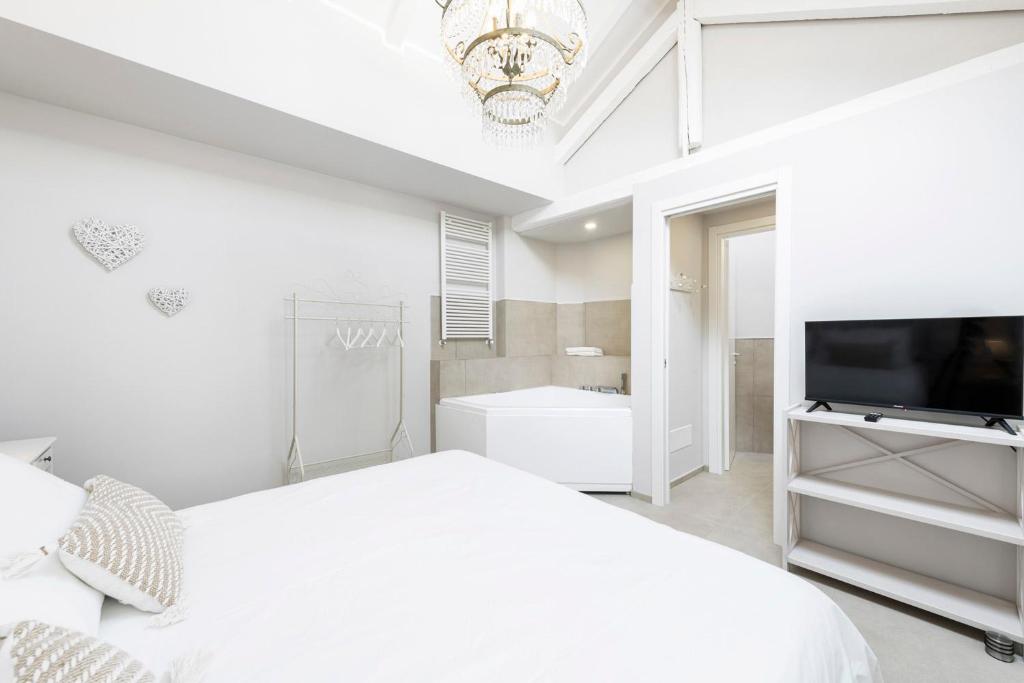 Postel nebo postele na pokoji v ubytování B&B De I Bravi