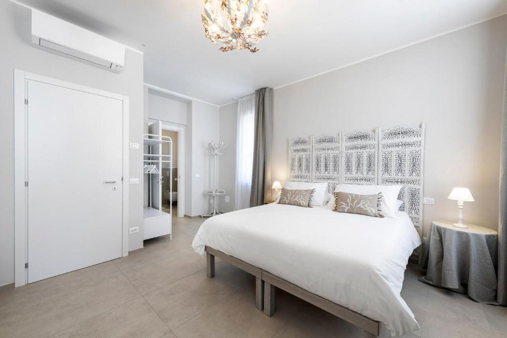 Postel nebo postele na pokoji v ubytování B&B De I Bravi
