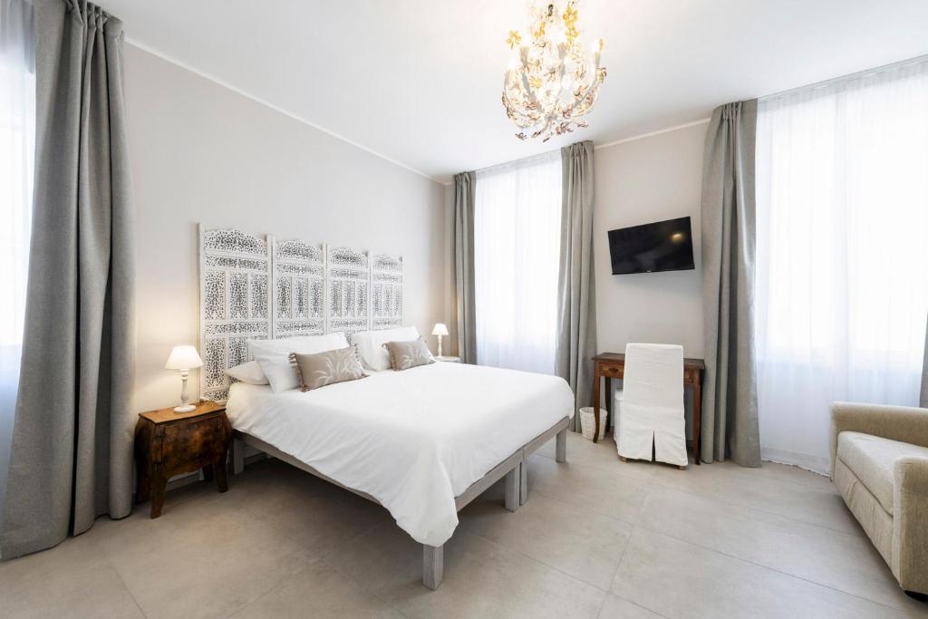 Postel nebo postele na pokoji v ubytování B&B De I Bravi