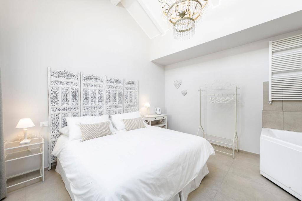 Postel nebo postele na pokoji v ubytování B&B De I Bravi