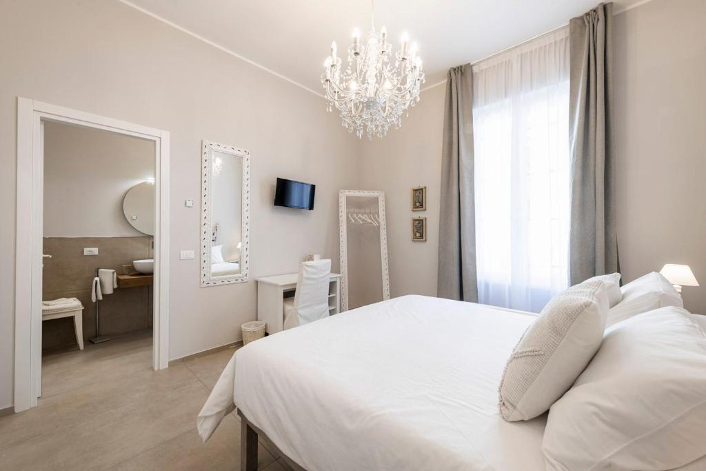 Postel nebo postele na pokoji v ubytování B&B De I Bravi