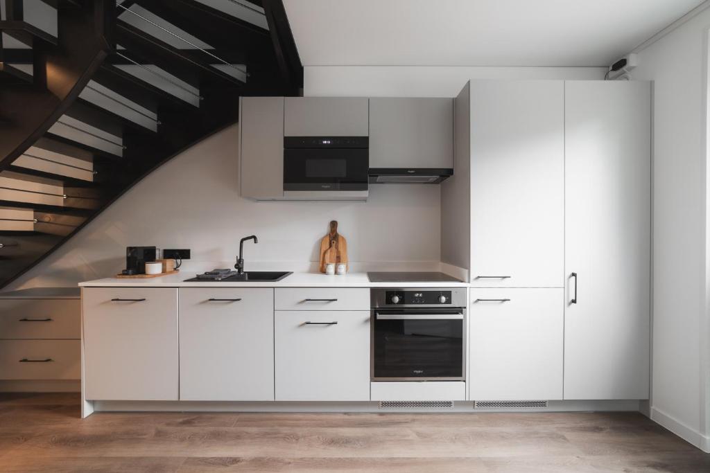 Kuchyň nebo kuchyňský kout v ubytování Neue stylische HÜSLE by UNIQUE PLACES