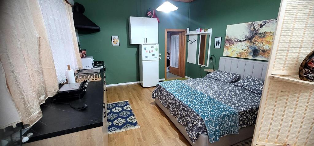 Postel nebo postele na pokoji v ubytování Teba Garden's Villa