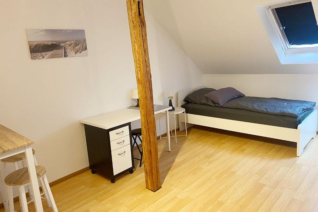 Postel nebo postele na pokoji v ubytování Nice Apartment in Zwickau