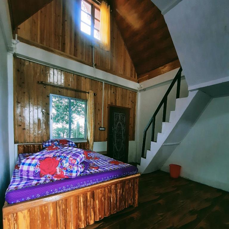 Postel nebo postele na pokoji v ubytování Bae Lae View Homestay