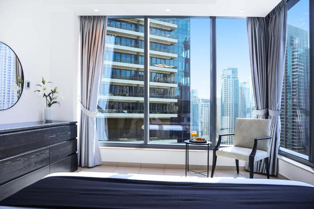 Posezení v ubytování Panoramic Luxe 1BR with Breathtaking Views at Dubai Marina Near JBR - Silverene Towers