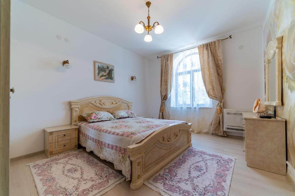 Postel nebo postele na pokoji v ubytování Villa Garden Beach