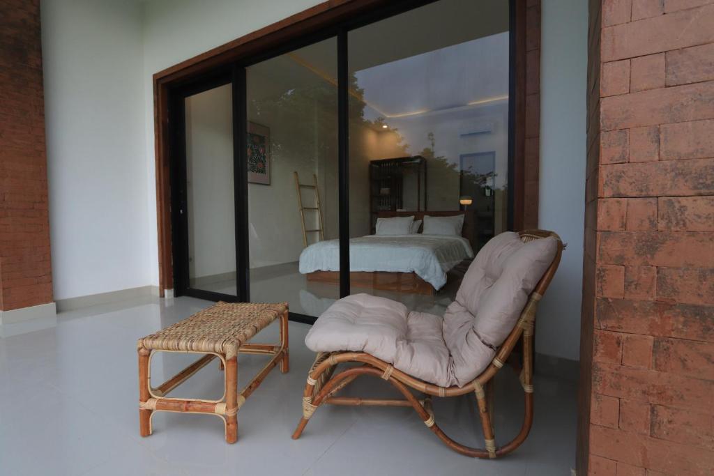 Posezení v ubytování Kayom Rooms