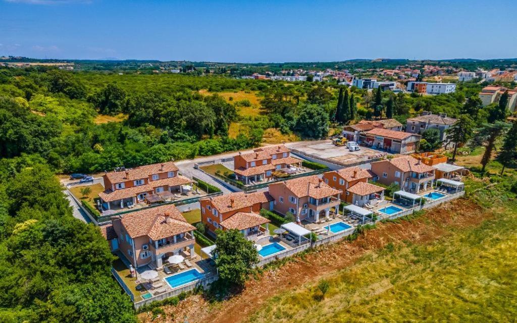 an aerial view of a large house with a yard at Villas Lotus with Pool and Jacuzzi in Pula