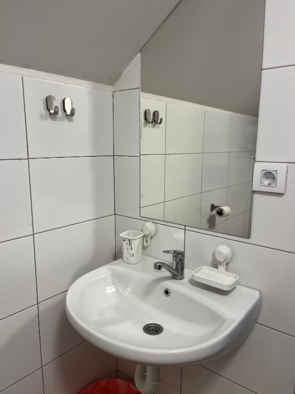 Koupelna v ubytování Apartmani Vinarije IN