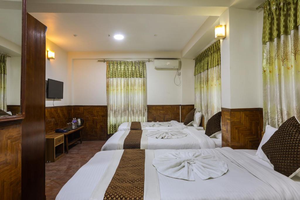 Postel nebo postele na pokoji v ubytování Hotel Sekai