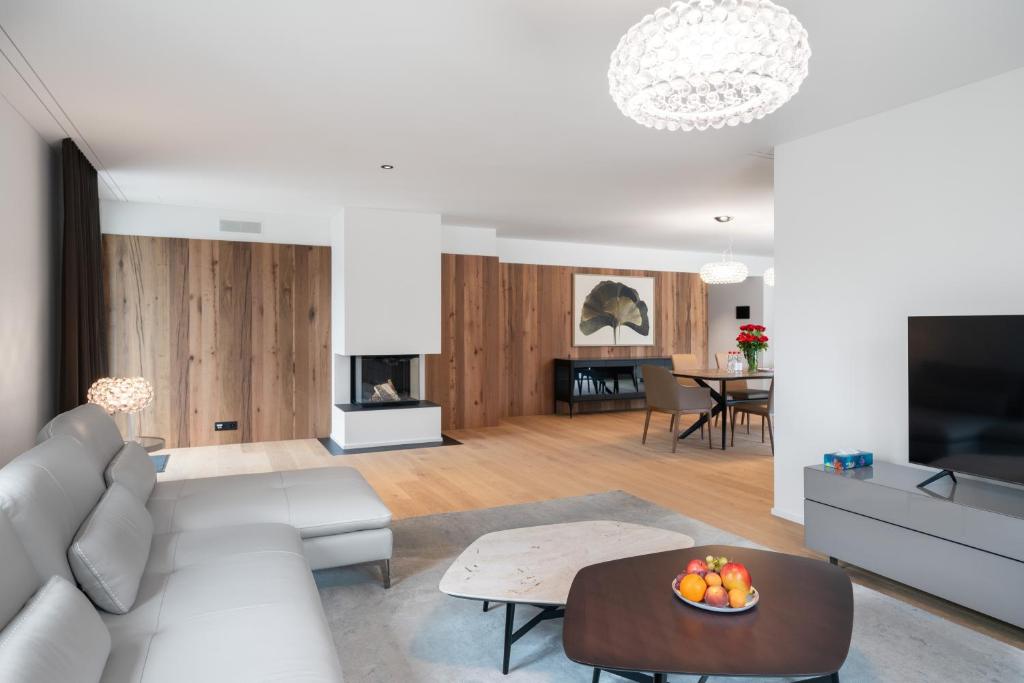 TV a/nebo společenská místnost v ubytování Swiss Hotel Apartments - Engelberg