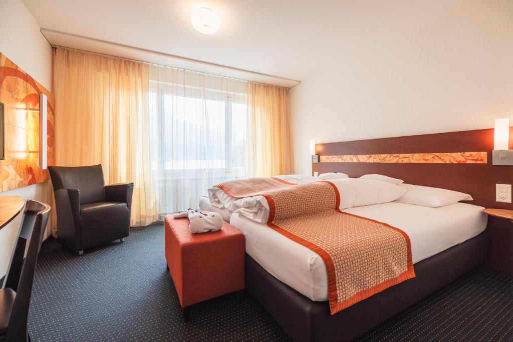 Postel nebo postele na pokoji v ubytování Hotel Seehof Superior