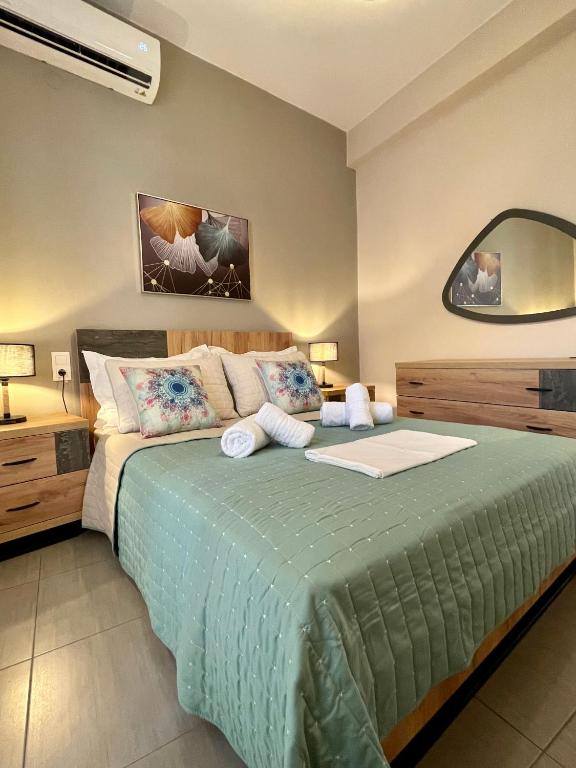Posteľ alebo postele v izbe v ubytovaní Skiathos home