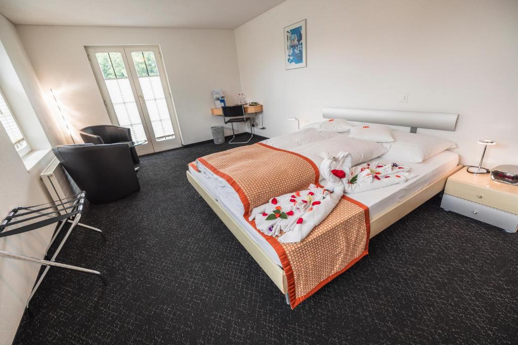 Postel nebo postele na pokoji v ubytování Hotel Seehof Superior