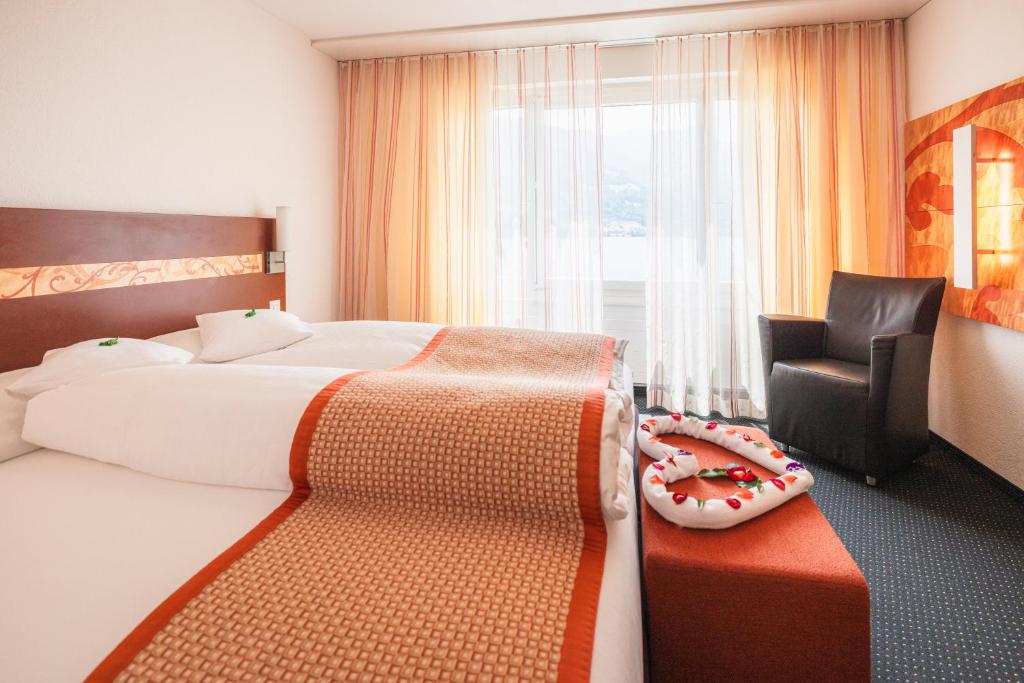 Postel nebo postele na pokoji v ubytování Hotel Seehof Superior