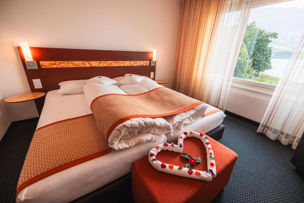 Postel nebo postele na pokoji v ubytování Hotel Seehof Superior