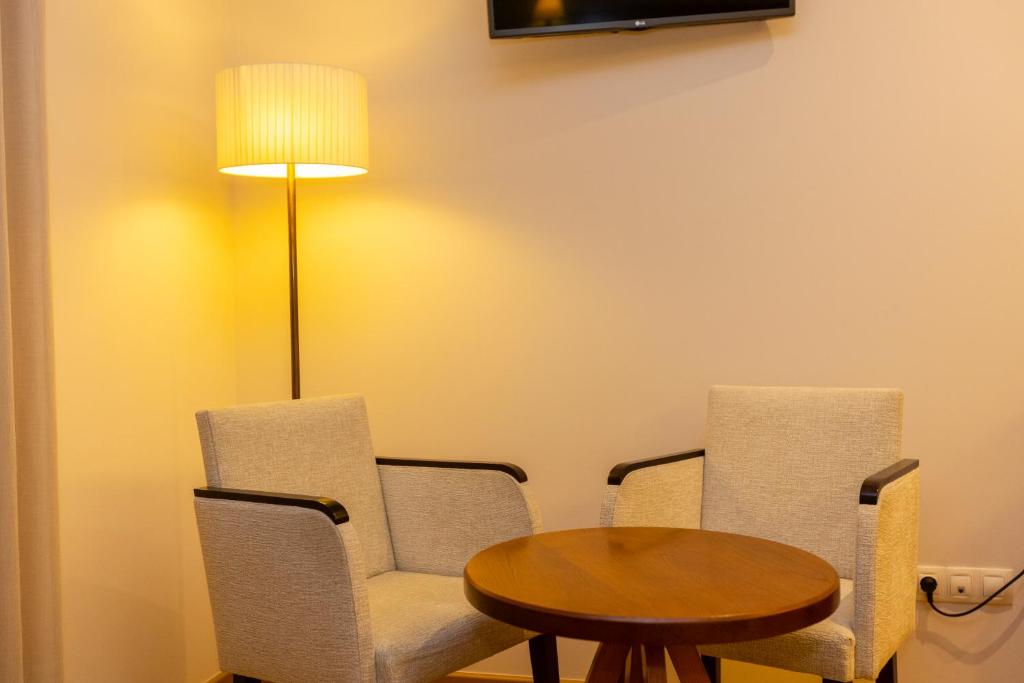 TV a/nebo společenská místnost v ubytování Hotel O Cabazo