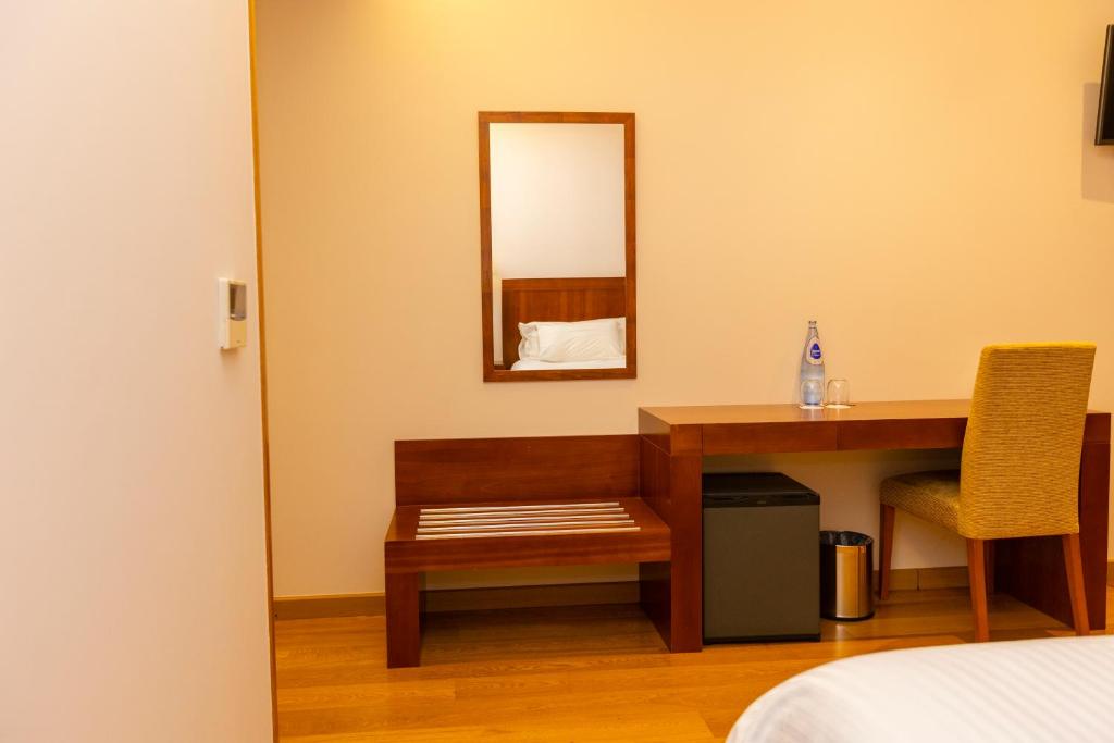 Postel nebo postele na pokoji v ubytování Hotel O Cabazo