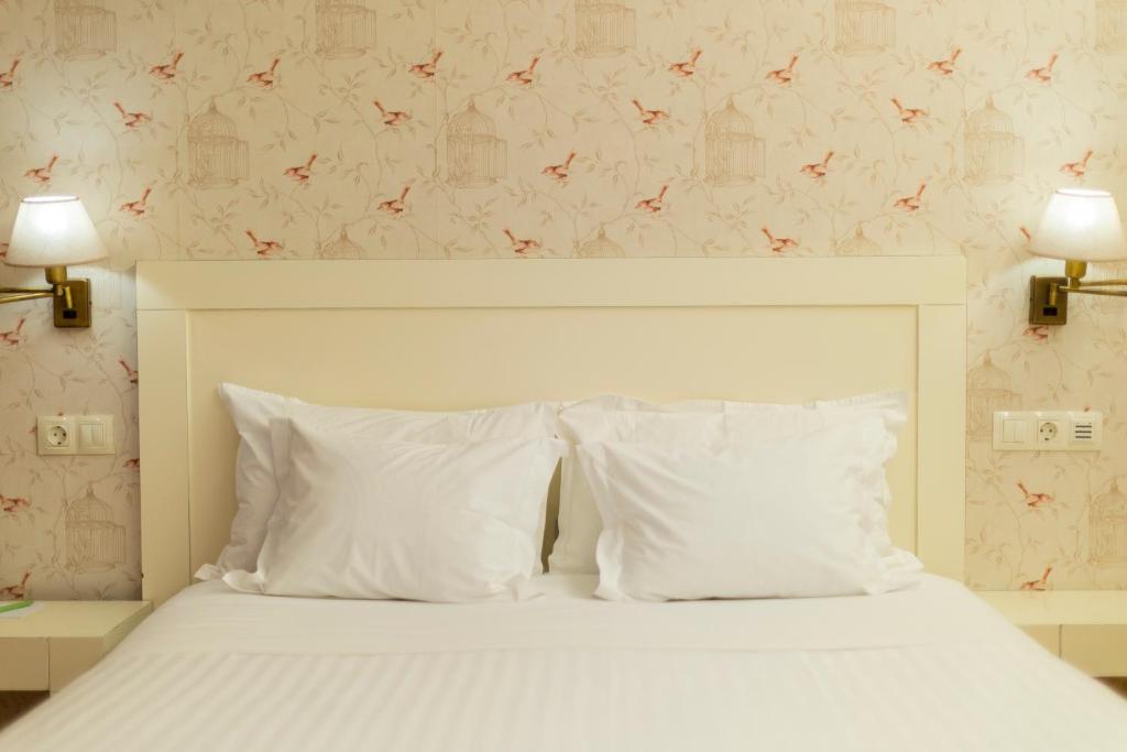 Postel nebo postele na pokoji v ubytování Hotel O Cabazo