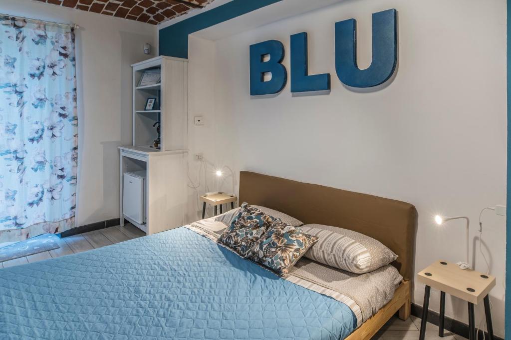Łóżko lub łóżka w pokoju w obiekcie Il Martinetto Bed & Breakfast