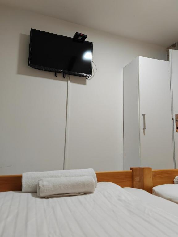 Postel nebo postele na pokoji v ubytování Apartmani Todorovic