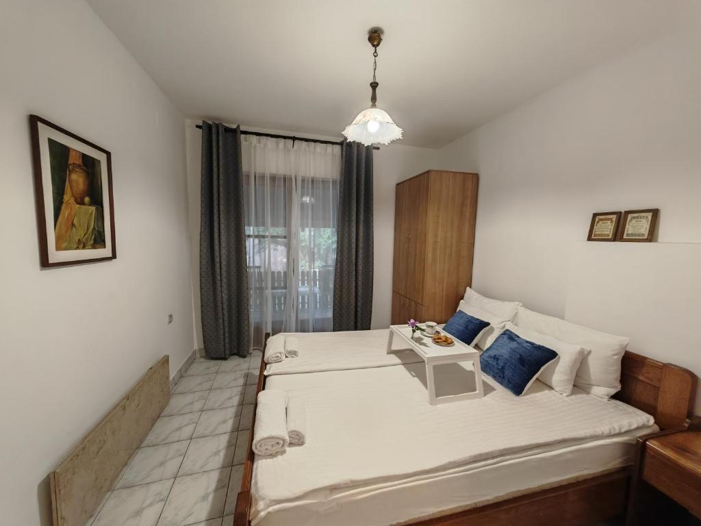 Postel nebo postele na pokoji v ubytování Apartmani Todorovic