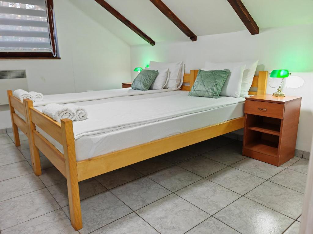 Postel nebo postele na pokoji v ubytování Apartmani Todorovic