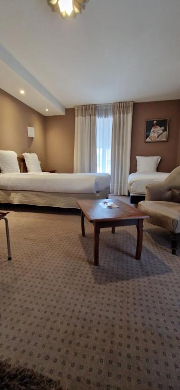 Posezení v ubytování Brit Hotel Essentiel Pontivy Robic