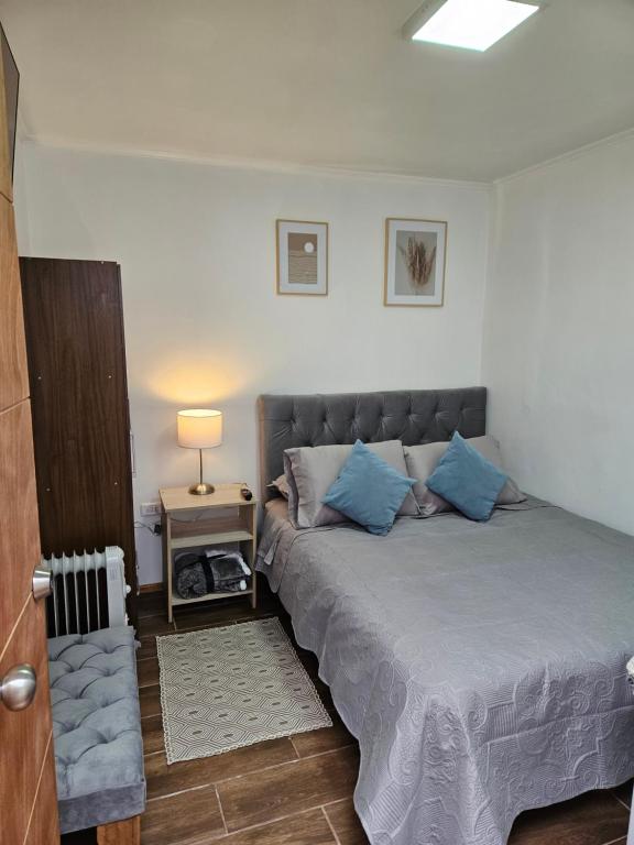 Postel nebo postele na pokoji v ubytování Guest House Club Hípico