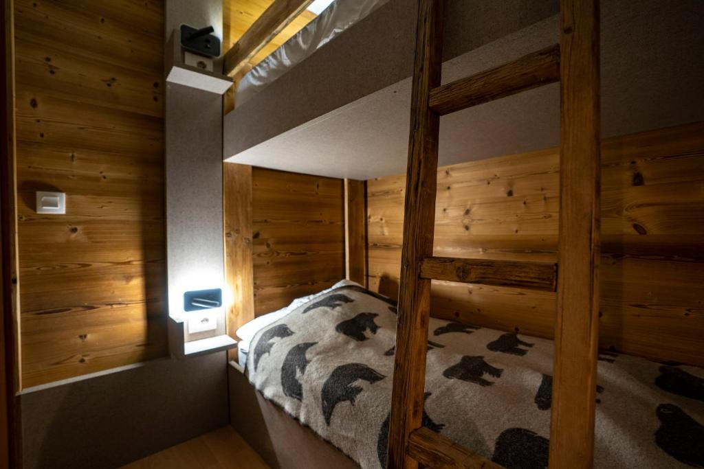 Postel nebo postele na pokoji v ubytování Peclet Appartements VTI