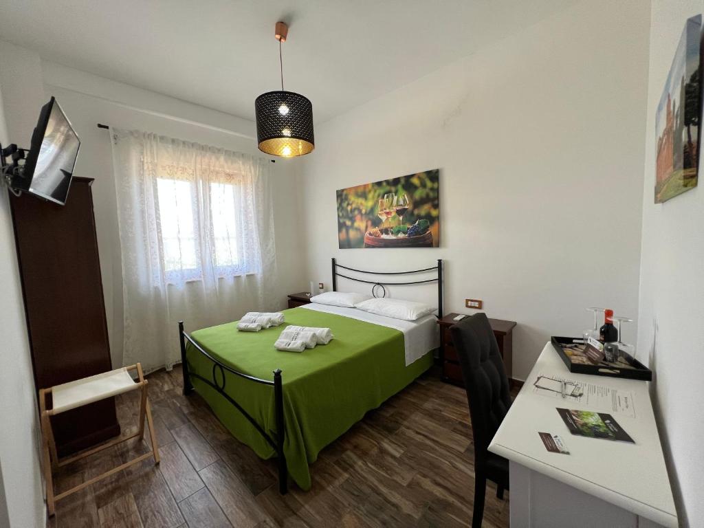 Posteľ alebo postele v izbe v ubytovaní B & B Vigna Di Filippo - Paestum