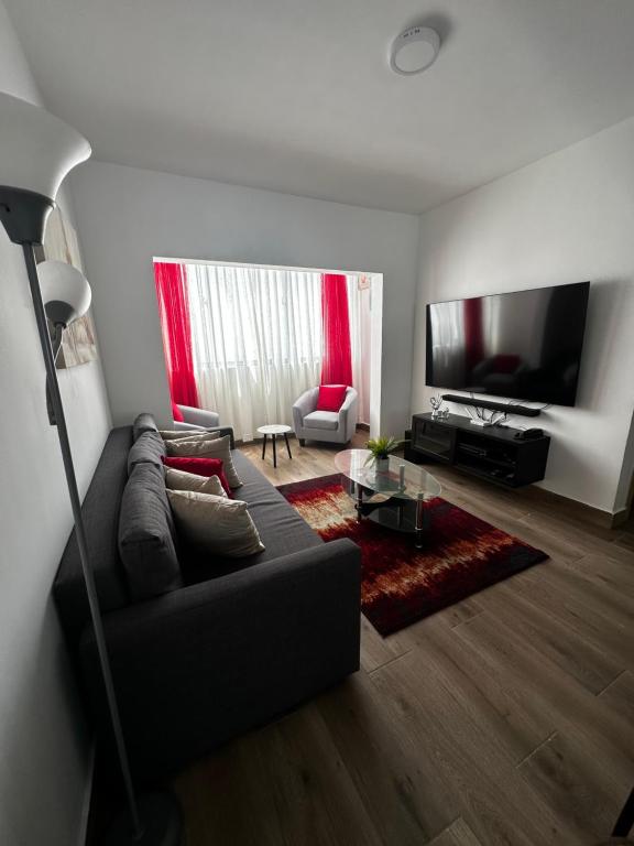 Posezení v ubytování Bávaro Apartamento 2bdr con Terraza y Jacuzzi Privado