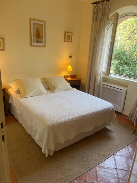 Postel nebo postele na pokoji v ubytování Le Mazet des Mûres