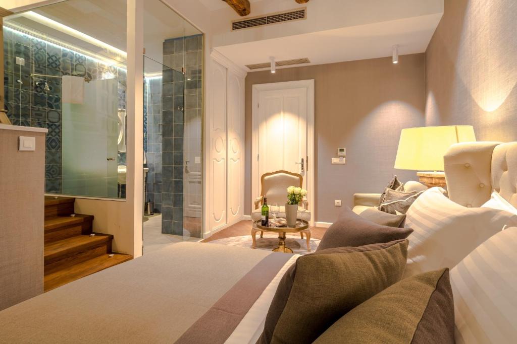 Posezení v ubytování Procurator 7 Luxury Rooms